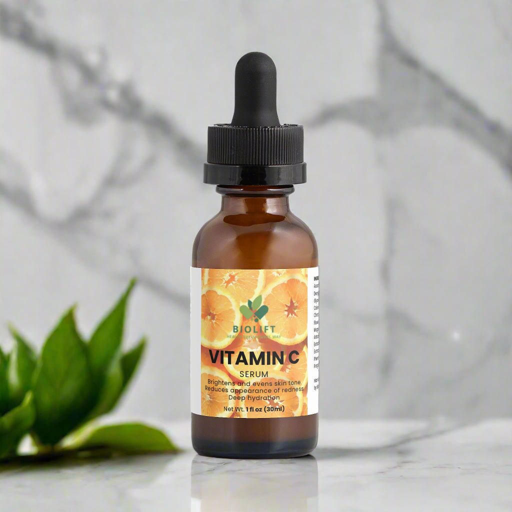 Brown glass bottle with dropper labeled 'Vitamin C Serum' on a white background